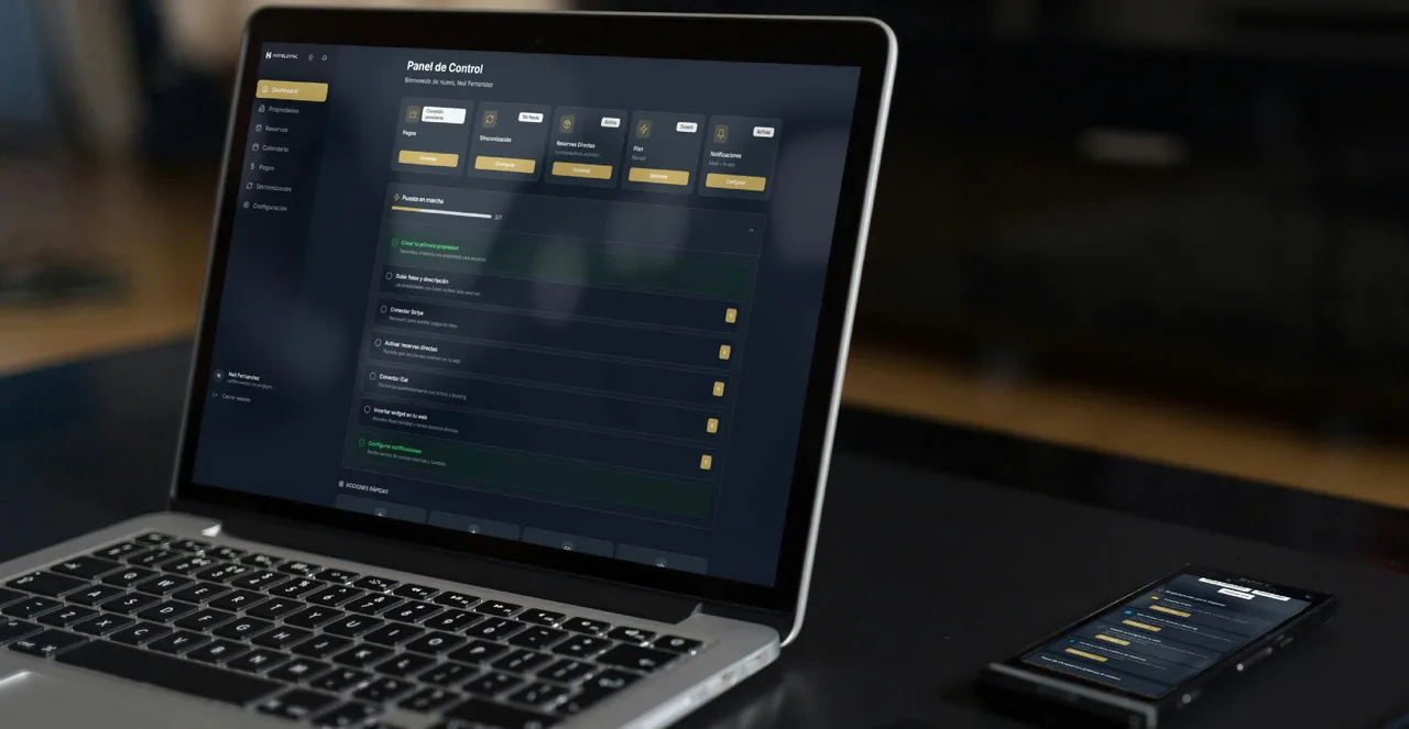 Laptop and smartphone displaying software dashboards and digital business data.